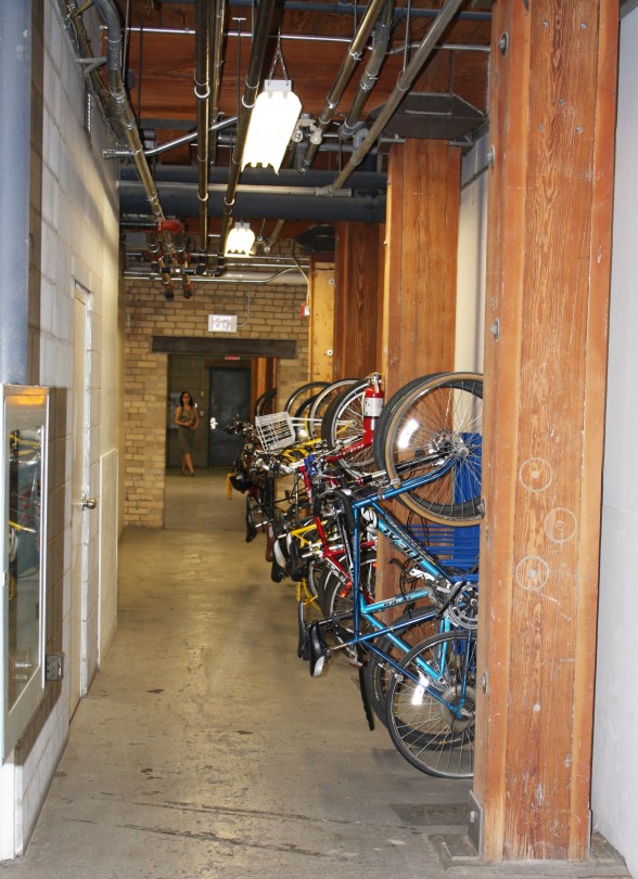 Employees park their bikes in the shared bike locker in the basement. 